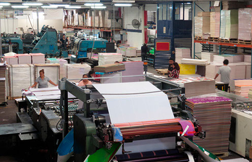 Workers at the notebook production line today